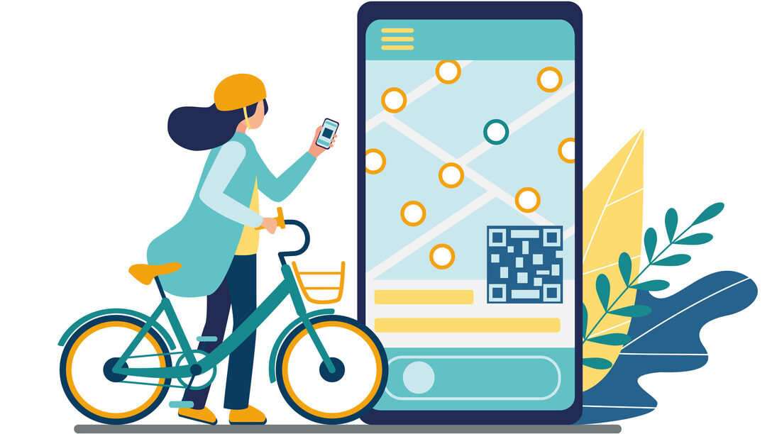 Frau mit Fahrrad gibt am Handy Daten für Bike-Sharing ein